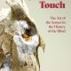 Picture shows the catalog cover illustrated with a profile, close-up of Teresa Jaynes’s Gift #1, a brown and white paper owl. Text in red letters is printed to the upper right of the image of the owl. Text reads: Common Touch [next line] The Arts of the Senses in the History of the Blind. [end of description]